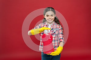 Disinfecting gels suitable for all family. Girl in rubber gloves for cleaning hold plastic bottle chemical liquid. Help
