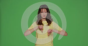Dislike, awful service. Dissatisfied young girl showing thumbs down, criticizing, feel disgust on chromakey background
