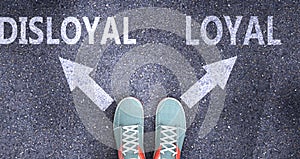 Disloyal and loyal as different choices in life - pictured as words Disloyal, loyal on a road to symbolize making decision and