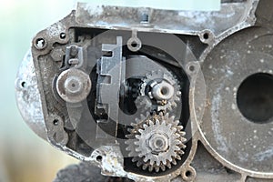 Dismantled engine old motorcycle, visible gears, shafts