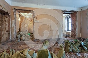 Dismantling of apartment`s interior before upgrade or remodeling, renovation, extension, restoration, reconstruction
