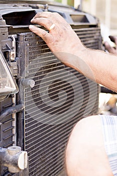 Dismantling broken car radiator