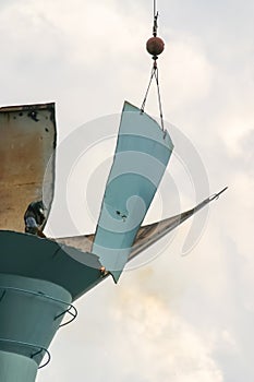 Dismantling of an old water tower on a beautiful summer`s day by torches and a large crane. This water tower was located in Ann Ar