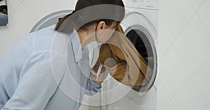 Dismayed Woman Unhappy with Laundry Results
