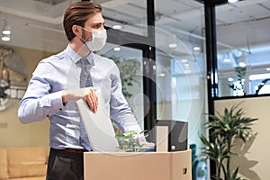 Dismissal employee in preventive medical mask in an epidemic coronavirus