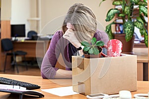 Dismissal at work, weeping employee