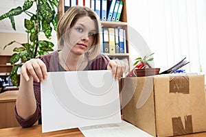 Dismissed worker with blank sheet of paper