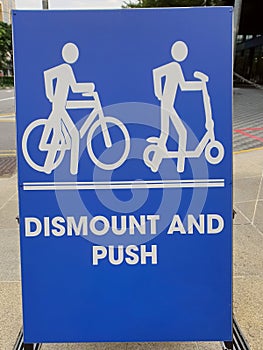 Dismount and push signage
