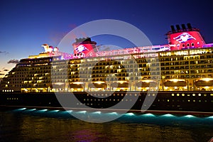 Disney cruise ship at night