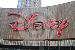 Disney sign on building at Lujiazui Financial District in a cloudy day