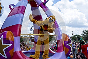 Disney World Orlando Florida Magic Kingdom parade pluto