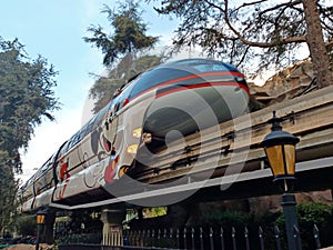 The Disneyland monorail is seen passing on the elevated track in Anaheim California.