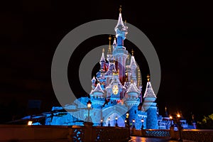 Disneyland Paris Castle during Christmas celebrations at night