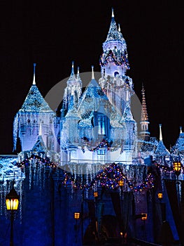 Disneyland`s Castle with holiday lights