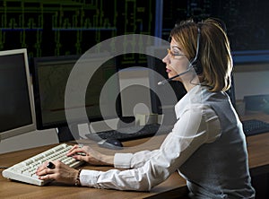 Dispatcher with headphone in power distribution control center