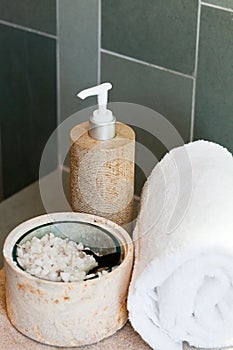 Dispenser, bath salt and towel