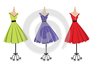 Display of 3 retro dresses