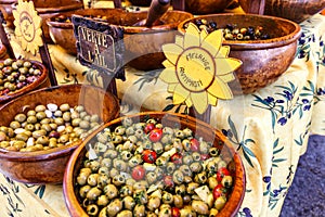 Display of assorted types of olives for sale