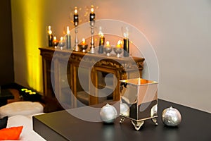 Display candles and lamps for decor at corporate event