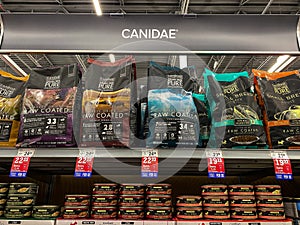 A display of Canidae Dog Food at a Petsmart Superstore