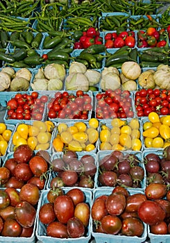 Display of fresh produce tomatoes and peppers