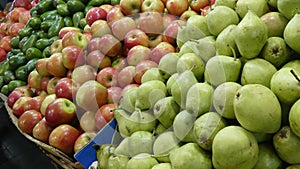 Display of fruit and vegetables on a market stall.