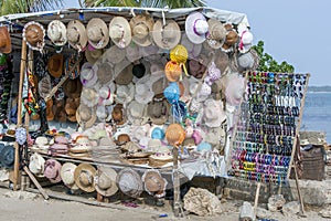 A display of hats and sunglasses for sale at Kurikadduwan port in the Jaffna region of Sri Lanka.