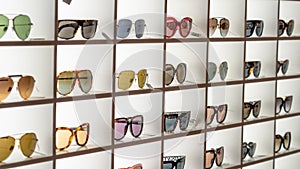 Display rack full of various sunglasses