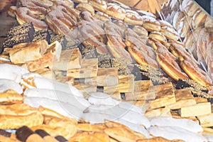 Display of traditional doughnuts on sale at Christmas market stall in Austria