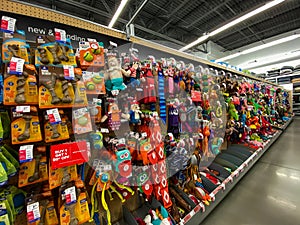 A display of various brands of dog toys for sale at a Petsmart Superstore