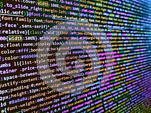 Displaying program code on computer. Software developer programming code on computer monitor. Mobile app developer. Concept screen