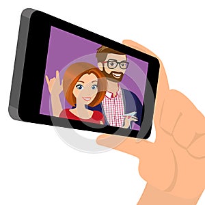 Displaying a snapshot of happy couple on the mobile phone photo