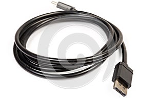 DisplayPort cable with full-size connectors closeup in selective focus