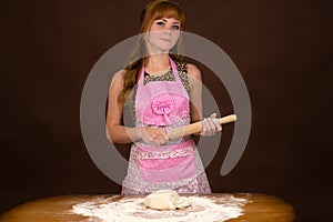 Displeased housewife with plunger in hand