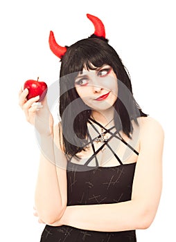 Displeased witch with red apple