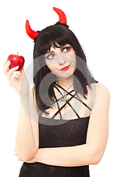 Displeased witch with red apple