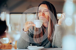 Displeased Woman Disliking Coffee for Tasting and Smelling Bad