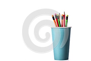 Bunch of multi colored wooden pencils with rubber eraser in blue paper cup