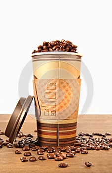 Disposable coffee cup with beans