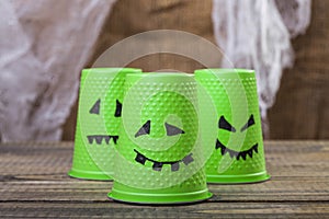 Disposable cups with ghost smiles