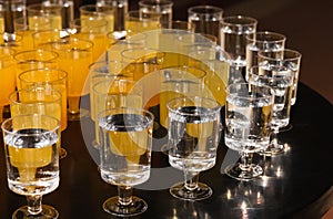 Disposable glasses with drinks