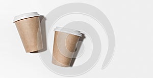 Disposable paper coffee cup isolated on white background. Mockup. Zero waste minimalistic concept. Copy space