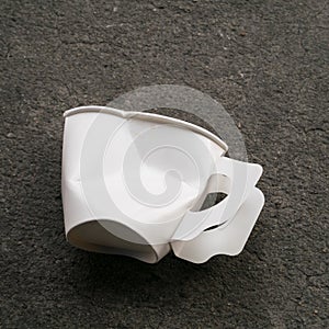 The disposable paper cup garbage (used coffee cup)