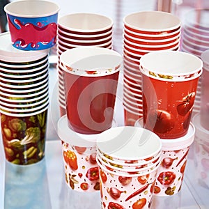 Disposable paper cups in cafe
