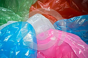 Disposable plastic bags background. Lightweight transparent, reusable plastic waste. Rubbish bags, plastic recycling,