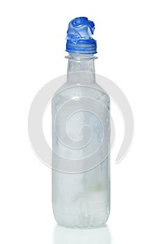 Disposable Plastic Bottle with Frozen Distilled Still Water Isolated Over White Background