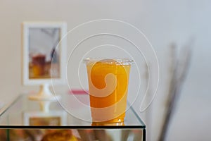 DISPOSABLE PLASTIC CUP DRINKS , plastic cup of orange