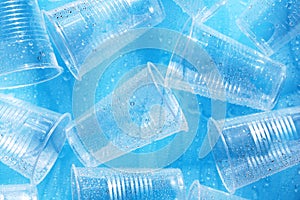 Disposable plastic cups with water drops