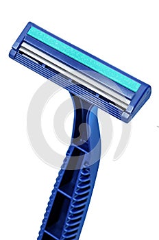 Disposable razor. Several blue razors on white background.