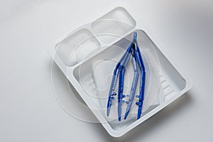 Disposable sterile dressing set on table